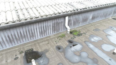 Pre-transformation shot showing the deteriorating asbestos roof.