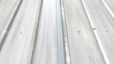 Aerial view of the asbestos roof before the overcladding process