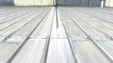 Initial state of the asbestos roof before the installation of the metal profile and solar PV system.