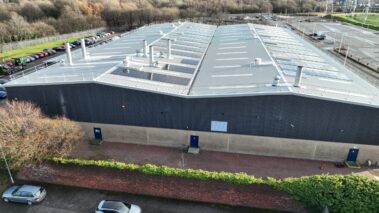 Perspective shot of the new roof illustrating the smooth transition from asbestos to metal profile