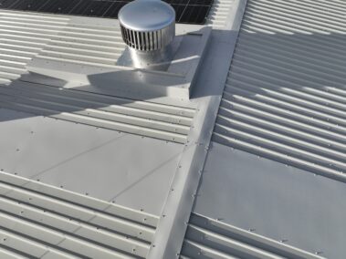 Innovative metal profiled roof with solar PV system contributing to the building's energy efficiency.