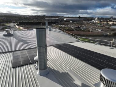 Bird's eye view of the metal profiled roof and the integrated solar PV system