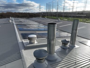 Wide-angle shot of the solar PV system integrated into the metal profiled roof