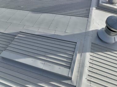 Close-up image showing the quality craftsmanship of the metal profiled roof installation.