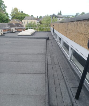 Close-up of the torch-applied bituminous felt, highlighting its texture and quality.