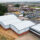 JLL Peacehaven commercial property roof and cladding refurbishment by Weatherproofing Advisors, with new insulation, rooflights, and Anthracite finishes.