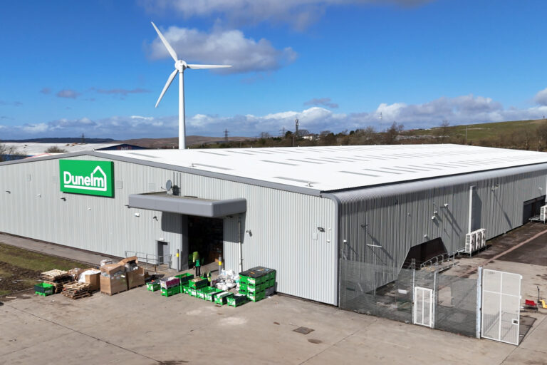 Refurbished roof and gutters at Dunelm Merthyr Tydfil with new insulation, rooflights, and mansafe safety system installed by Weatherproofing Advisors.