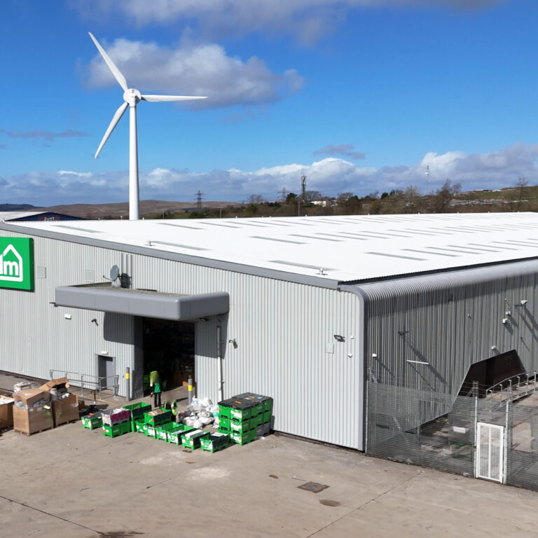 Refurbished roof and gutters at Dunelm Merthyr Tydfil with new insulation, rooflights, and mansafe safety system installed by Weatherproofing Advisors.